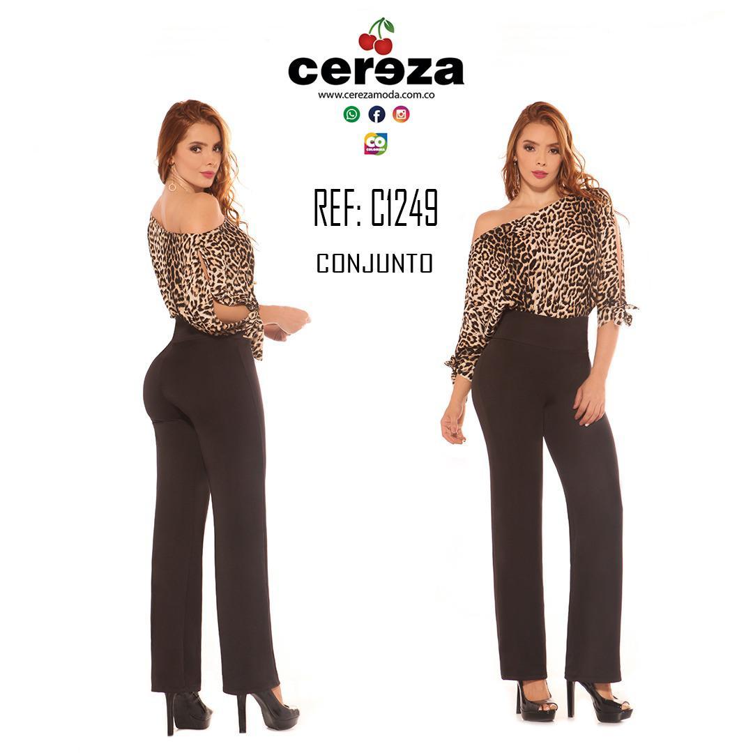 Colombian pants and blouse set. Bottom in Black Semi Wide Boots and Top with Animal Print Print Long Sleeves.