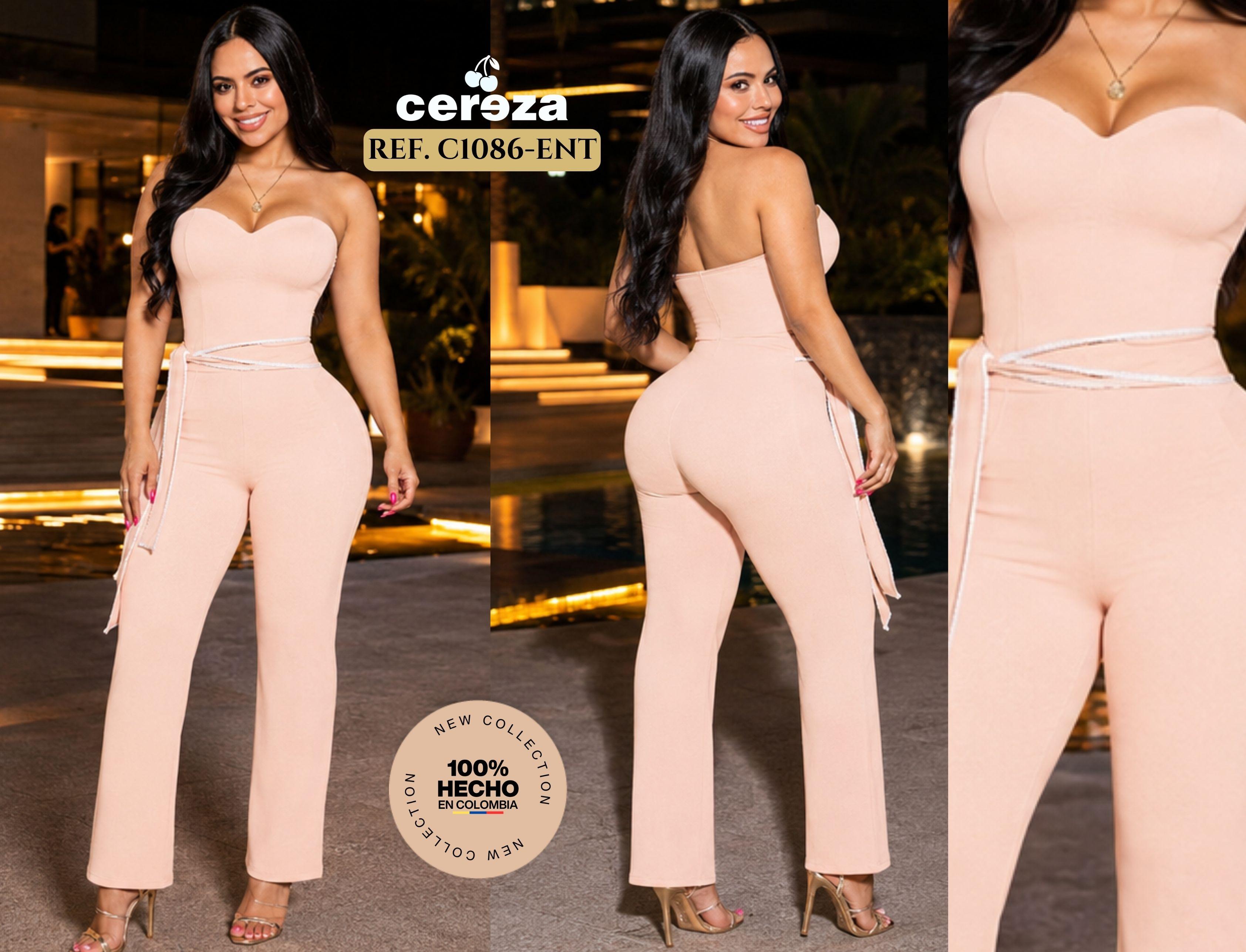 Sensational Colombian Enterizo onepiece , with bare shoulder design and beautiful pink color, decorative long belt.